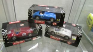 Three boxed Ninco Ferrari 166mm model racing cars.