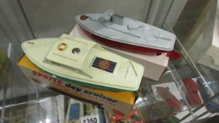 Two boxed Sutcliffe clockwork boats - Sprite Day Cruiser and Snappy.