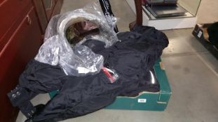 An Akito Cobra waterproof jacket size 42, Frank Thomas waterproof trousers XXXL plus gloves and 4