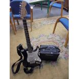 A Fender Squire S/N ICS 15082485 guitar with soft case, instruction books and Blackstar Amplifier,