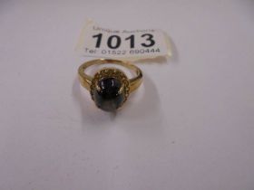 A yellow gold ring set large Cabachon, size T, 5 grams,