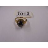 A yellow gold ring set large Cabachon, size T, 5 grams,