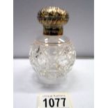 A nice Hobnail cut silver topped scent bottle.