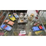 A quantity of play worn 1960's sports cars including Jaguar, MG, Triumph etc.,