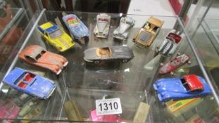 A quantity of play worn 1960's sports cars including Jaguar, MG, Triumph etc.,