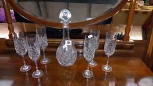 A heavy cut glass decanter & 6 glasses