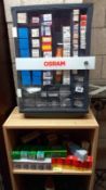 A vintage garage Osram car light bulb shop display cabinet and varied selection of boxed bulbs