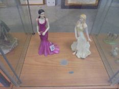 Two Royal Doulton figurines - Natalie and Harmony.