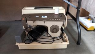 A vintage Singer L47 electric sewing machine. COLLECT ONLY