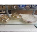 Two silver plate tureens and a hors d'ouvre dish with glass liners.