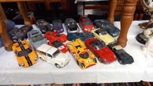 A good collection of mainly 1/18 scale diecast model cars including Jaguar, MG etc