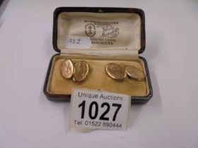 A cased pair of 9ct gold cuff links, 3.35 grams.