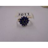 A yellow gold ring set lapiz lazuli, size Q, 3.6 grams.