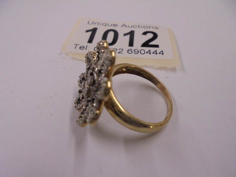 A large floral diamond and yellow gold ring, size M, 4.4 grams. - Image 2 of 2