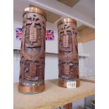 A pair of oriental carved wood vases/brush pots, a/f (both cracked).