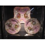 A fine porcelain dish with two matching plate with crossed swords mark.