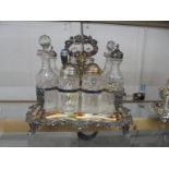 A good quality Victorian eight bottle condiment set.