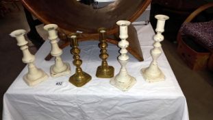 3 pairs of Victorian brass candlesticks