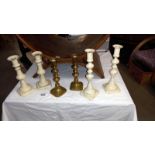 3 pairs of Victorian brass candlesticks