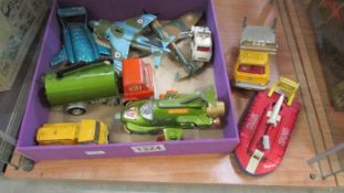 A quantity of unboxed die cast Dinky toys including UFO, Thunderbirds, Police Mini Cooper etc.,
