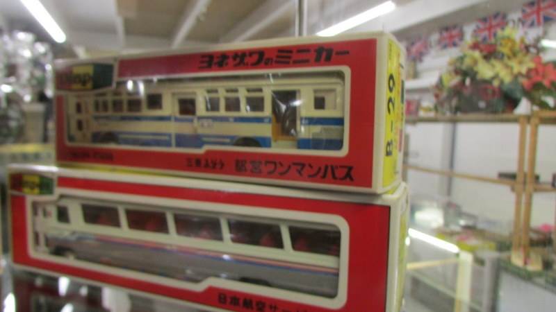 Four boxed Yonezawa Diapet die cast buses. - Image 2 of 3