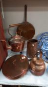 A good lot of copper pans, jug & kettles