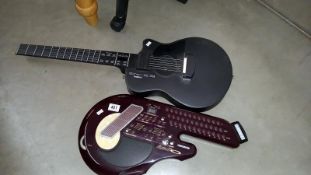 A Yamaha EZ-AG and a Suzuki QC1 digital guitars, COLLECT ONLY