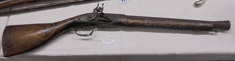 A Blunderbuss with Brass string inlay.