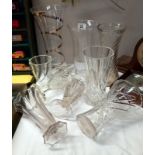 A quantity of cut & moulded glass vases