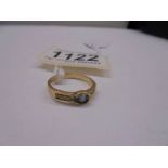 A unmarked ring (tests poss. 18ct) size O, 3.1 grams.