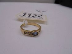 A unmarked ring (tests poss. 18ct) size O, 3.1 grams.