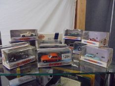 13 boxed Matchbox/Dinky die cast models, some loose in boxes.