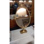 A brass ormalu dressing table mirror COLLECT ONLY