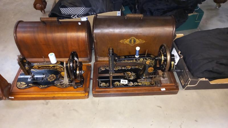 A cased Singer sewing machine (late 19th century) and 1 other early cased Singer sewing machine,