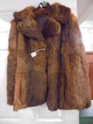 A good quality coney fur jacket, size 14.