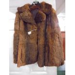 A good quality coney fur jacket, size 14.