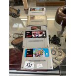 A Nintendo super Mario kart (super NES) plus 4 others , no boxes or instructions