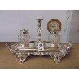 A silver Walker and Hall inkstand with central silver candlestick & glass inkwells with silver tops.