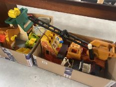 2 boxes of vintage Fisher Price including crane, shop till and lift and load depot