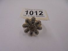A large floral diamond and yellow gold ring, size M, 4.4 grams.