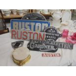 A good lot of 20th century Rustons and other cast signs and a brass gauge.