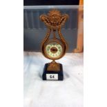 A gilt ormalu mantle clock