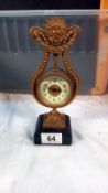 A gilt ormalu mantle clock