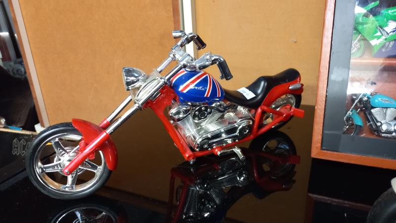 A collection of plastic motorbike models including a display case - Image 3 of 5
