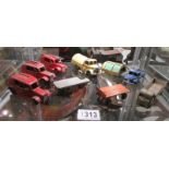 A quantity of play worn Dinky commercial vehicles including fire engine.