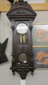 A Victorian mahogany twin weight Vienna wall clock, COLLECT ONLY.