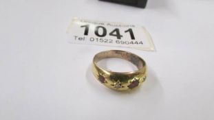 A 9ct gold ring size M, 2.7 grams.
