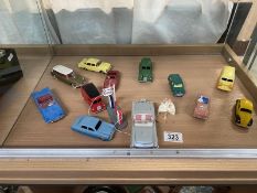 A good selection of unboxed Atlas dinky toys including Corgi, Marilyn Monroe figure, Ford & Thunder