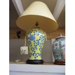 An oriental ceramic table lamp with shade. COLLECT ONLY.