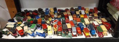A large collection of unboxed Lledo die cast vans & cars